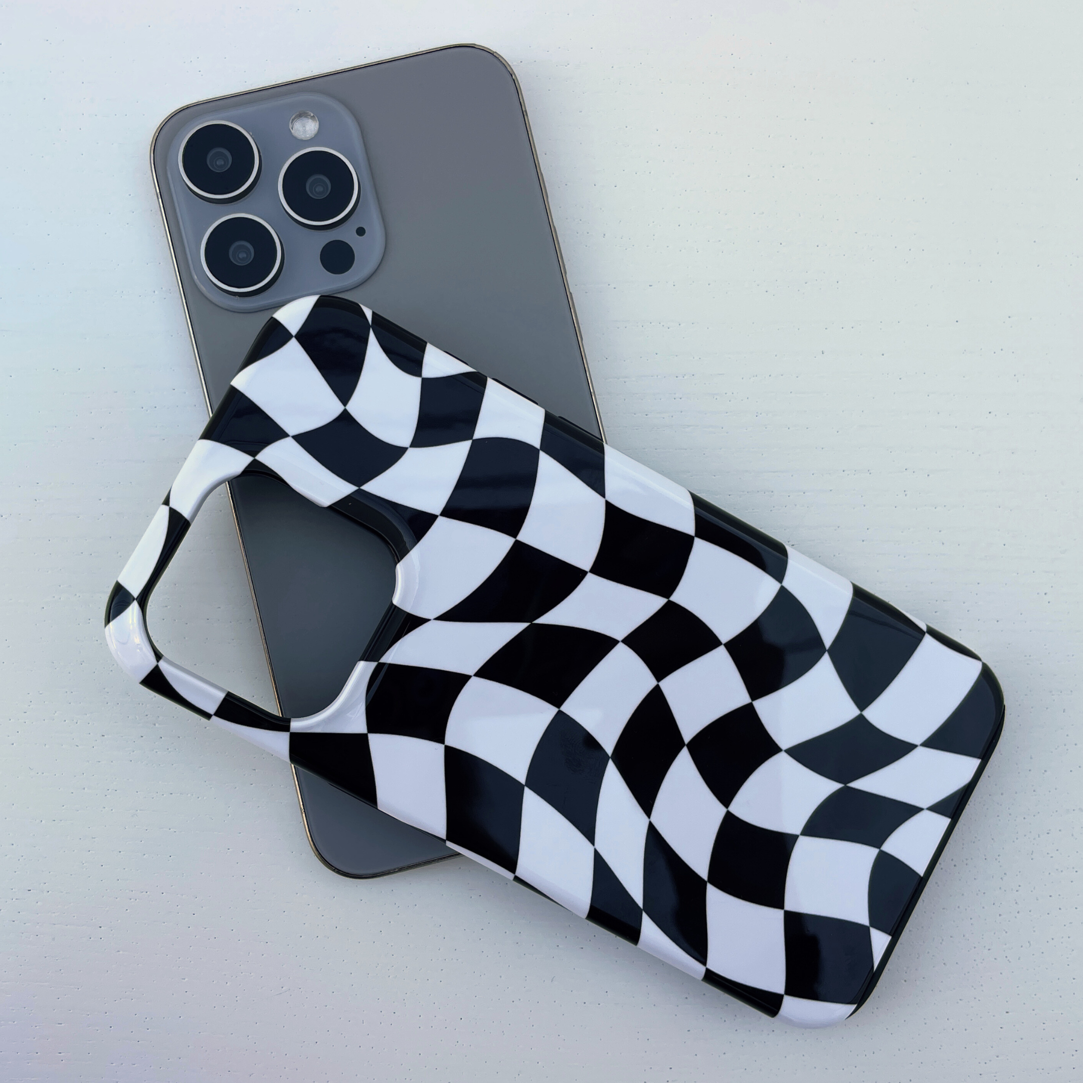 Black White Checkered Phone Case, B7Cases, Phone, Phone Case, Tough Case, Snap Case, iPhone, Apple, iPhone Case, Cover, MagSafe, Samsung Galaxy, iPhone X, XS, XS max, XR, 11, 12, iPhone SE, 13, Mini, iPhone 14, Plus, iPhone 15, 15 plus, 15 pro, 15 pro max, Galaxy S10, S20, S21, S22, S23, Checkered Phone Case, Checker, Check, Checked, Chess, Square, Geometric, Mosaic, Grid, Warped, Swirl, Distorted, Retro, Vintage, Hippie, Hipster, Groovy, Spire, Tile, Spiral, Geometric Shape, Checkerboard, Plaid, Wavy